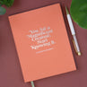 view Front cover of coral Elizabeth Gilbert Magnificent Creature Journal with silver foil stamping