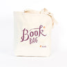 view Em & Friends Book* (Wine) Tote Bag by Em and Friends, SKU 2-02133